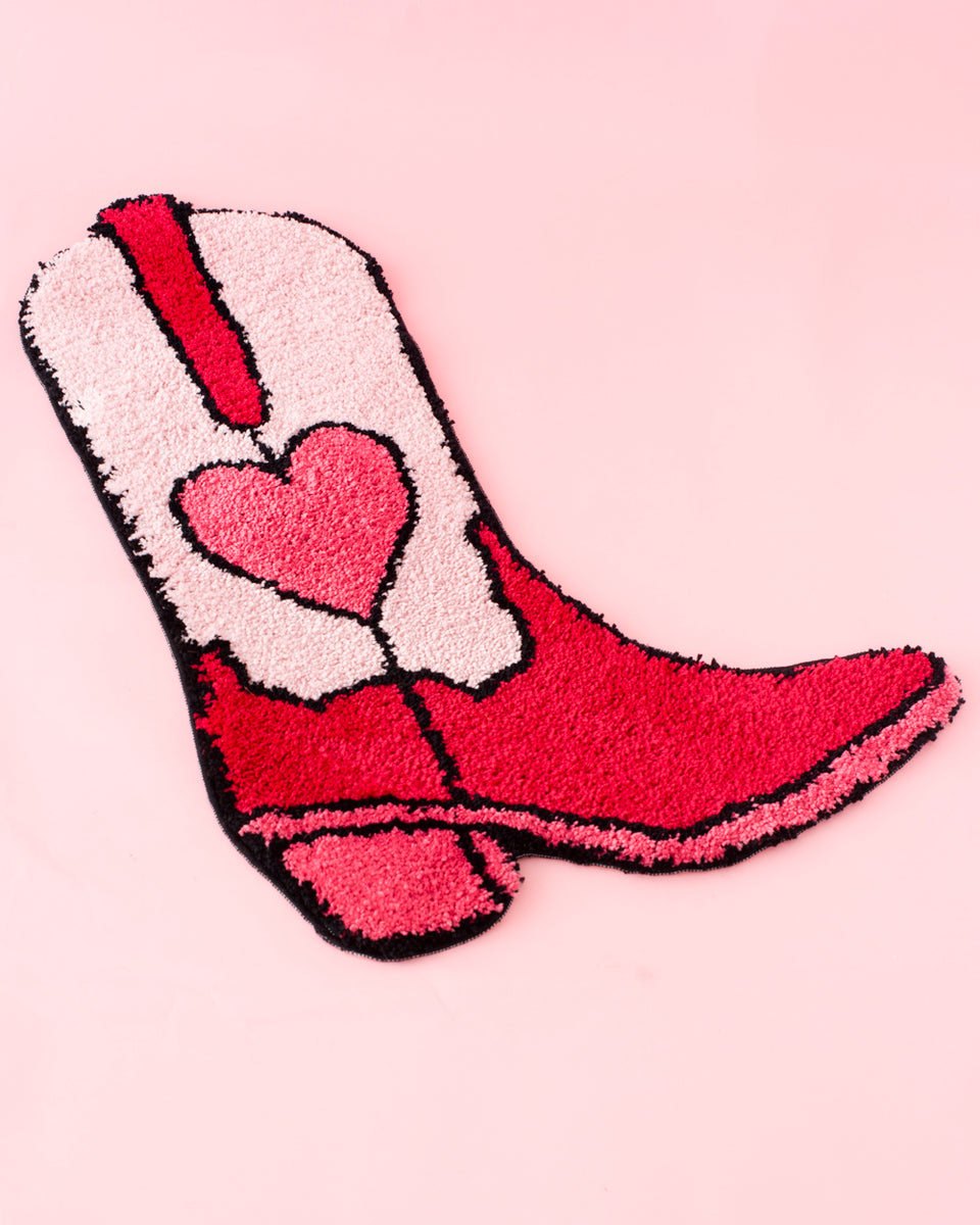 https://www.kitschandcolor.com/cdn/shop/files/cowboy_cowgirl_boot_rug_1_1200x1200_crop_center.jpg?v=1692912444